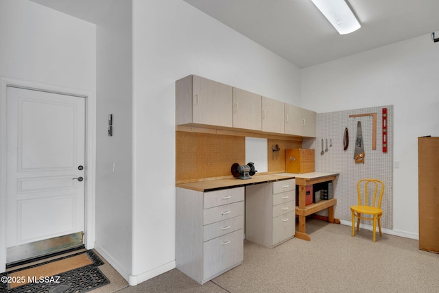 interior space with baseboards
