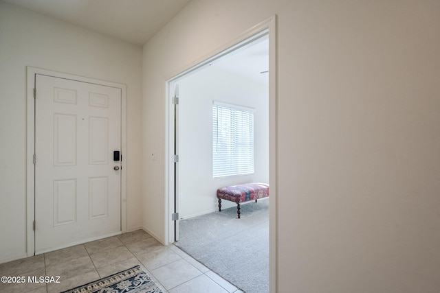 view of tiled foyer entrance