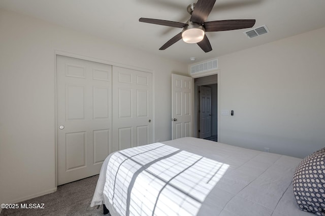 bedroom with carpet, a closet, and ceiling fan