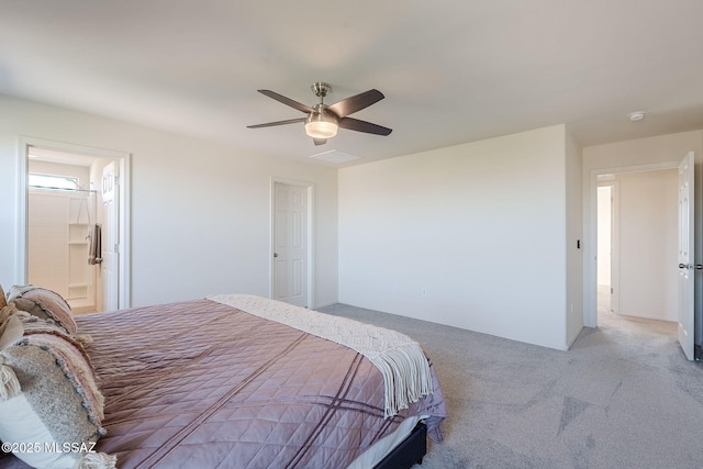 bedroom with ceiling fan and light carpet