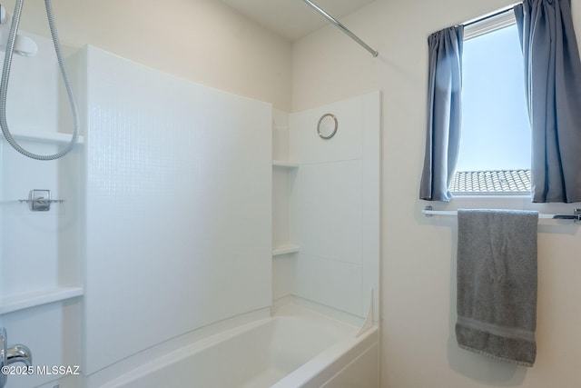 bathroom with shower / bath combination