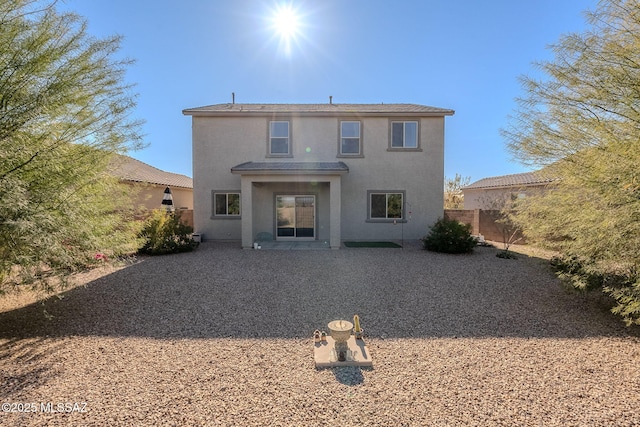 back of house featuring a patio area