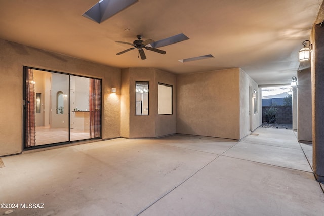 view of patio featuring ceiling fan