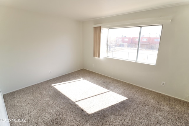 view of carpeted spare room