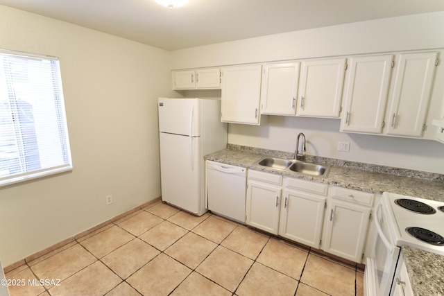 kitchen with white cabinetry, sink, light tile patterned floors, and white appliances