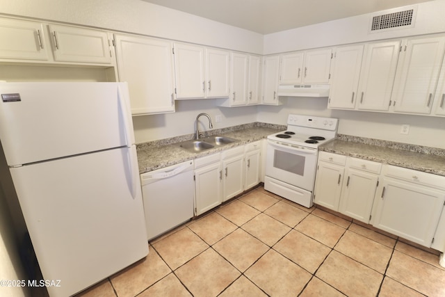 kitchen with white cabinetry, sink, white appliances, and light tile patterned floors