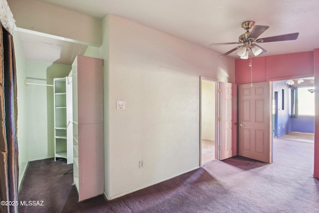 interior space with lofted ceiling, carpet, and a closet