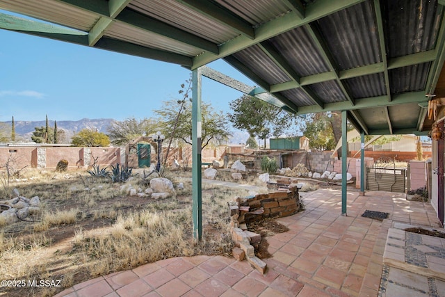 view of patio / terrace with a mountain view