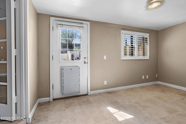 entrance foyer featuring baseboards