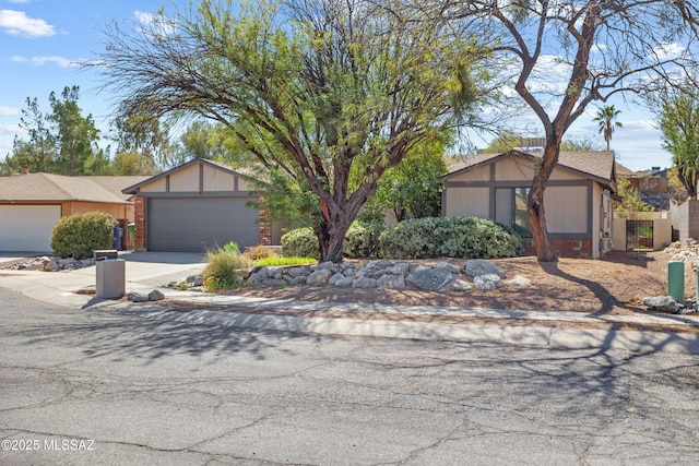 view of front of home featuring driveway and an attached garage