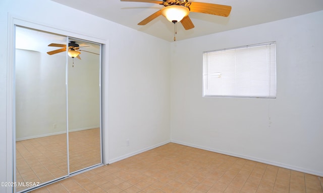 spare room featuring ceiling fan