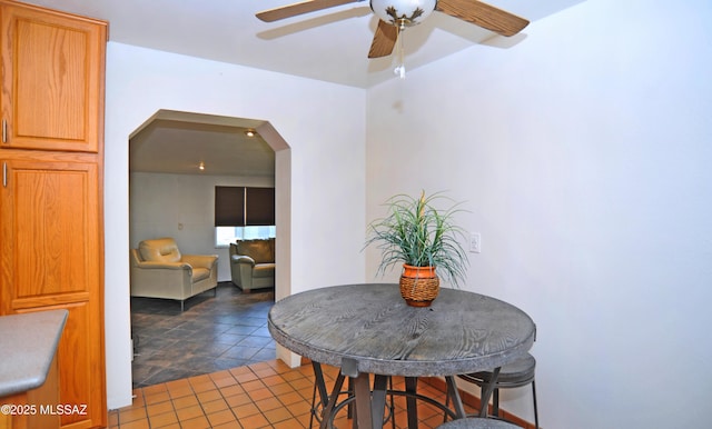 dining area featuring ceiling fan