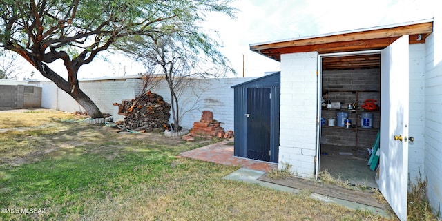 view of outdoor structure with a lawn