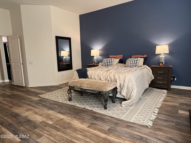 bedroom featuring dark hardwood / wood-style floors