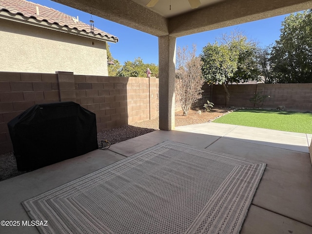 view of patio with a grill