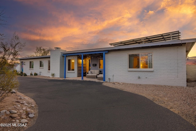 view of front of home featuring a patio