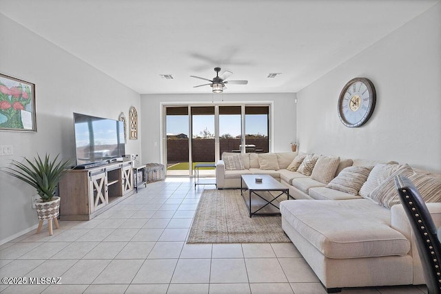 tiled living room with ceiling fan