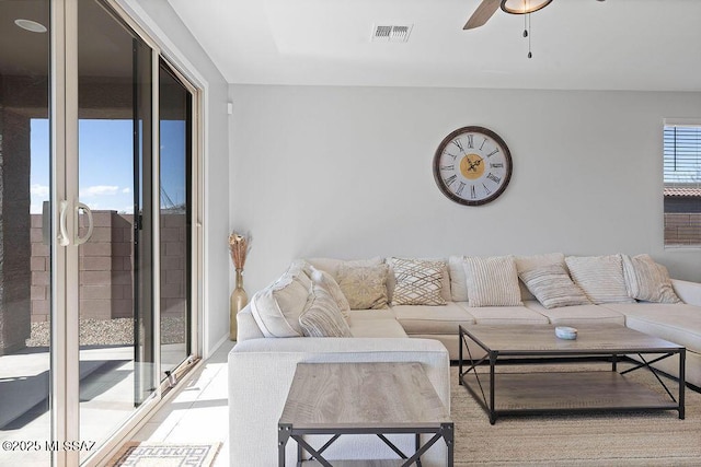 living room featuring ceiling fan