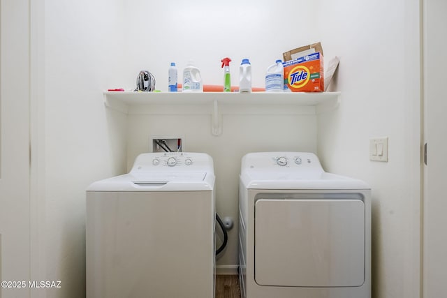 laundry room with washer and dryer