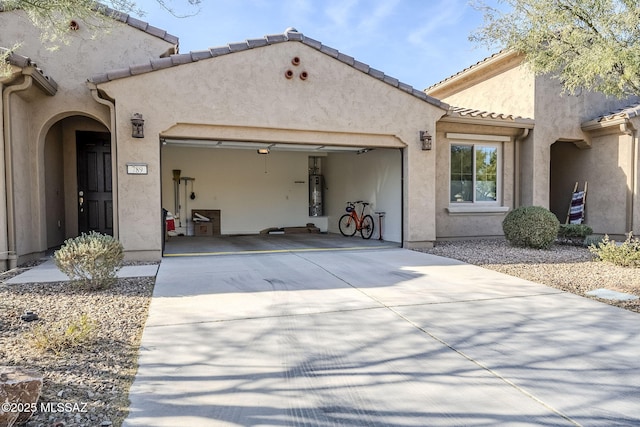 view of side of home featuring a garage and gas water heater