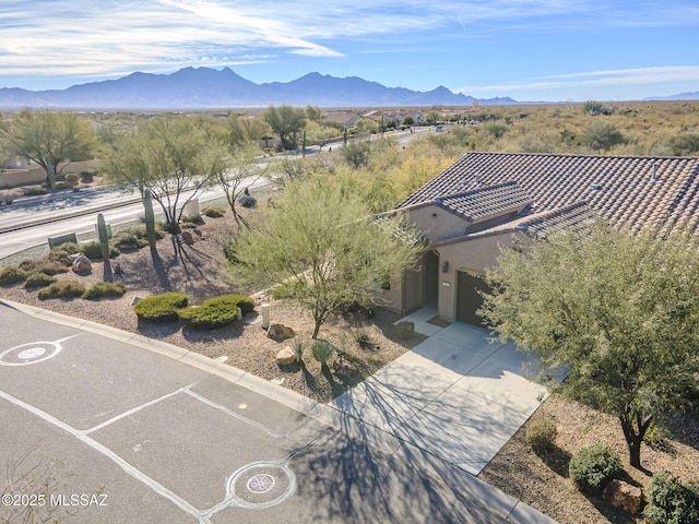 bird's eye view with a mountain view