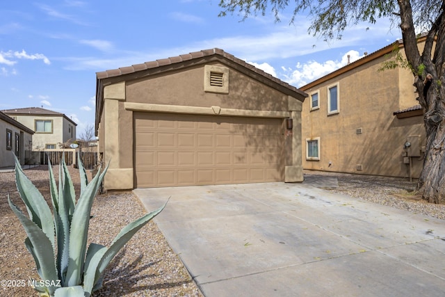 view of front of home featuring an outbuilding and a garage