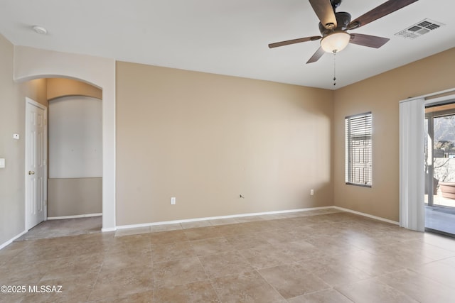 empty room featuring ceiling fan