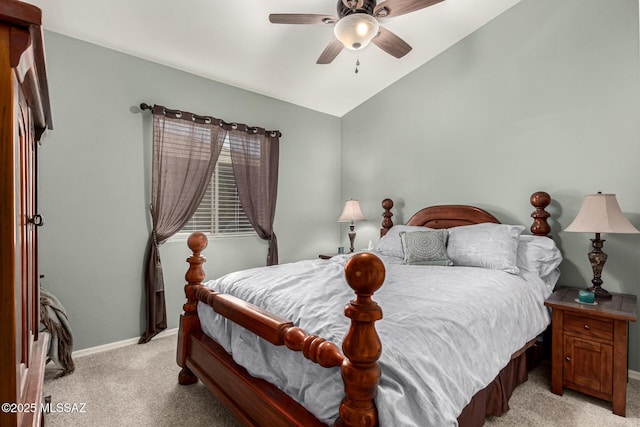 bedroom featuring light carpet, vaulted ceiling, and ceiling fan