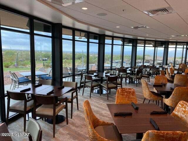 dining room with floor to ceiling windows