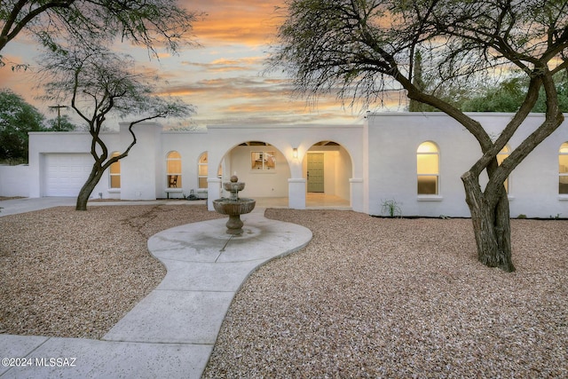 view of front of home featuring a garage