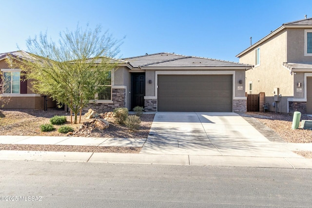 view of front of property featuring a garage