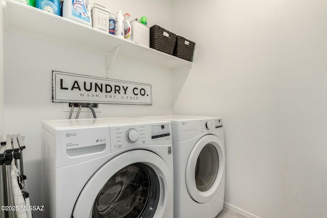 laundry room with separate washer and dryer