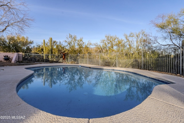 view of swimming pool featuring a fenced in pool and a fenced backyard