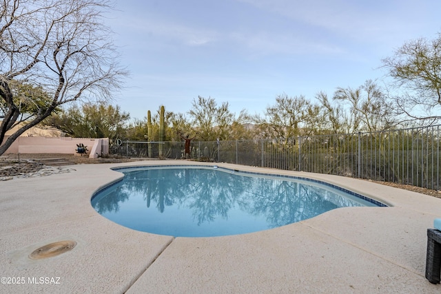 view of pool with a patio, a fenced backyard, and a fenced in pool