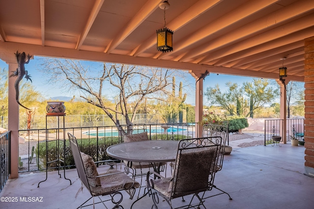 view of patio / terrace featuring a fenced in pool and fence private yard