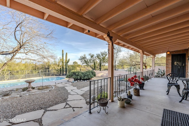 view of patio / terrace featuring a fenced in pool and fence private yard