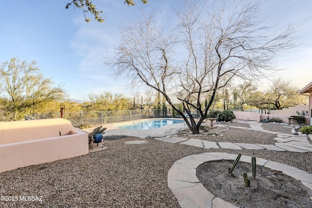 view of swimming pool with a fenced in pool, a patio, and a fenced backyard