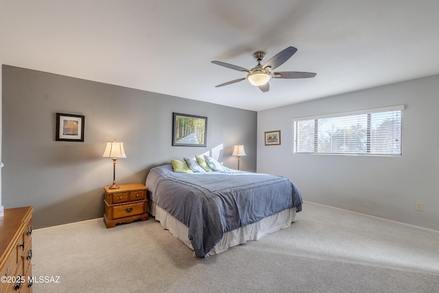 bedroom featuring ceiling fan and carpet flooring