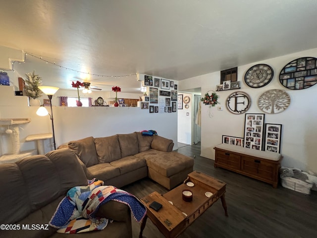 living room featuring dark wood-type flooring