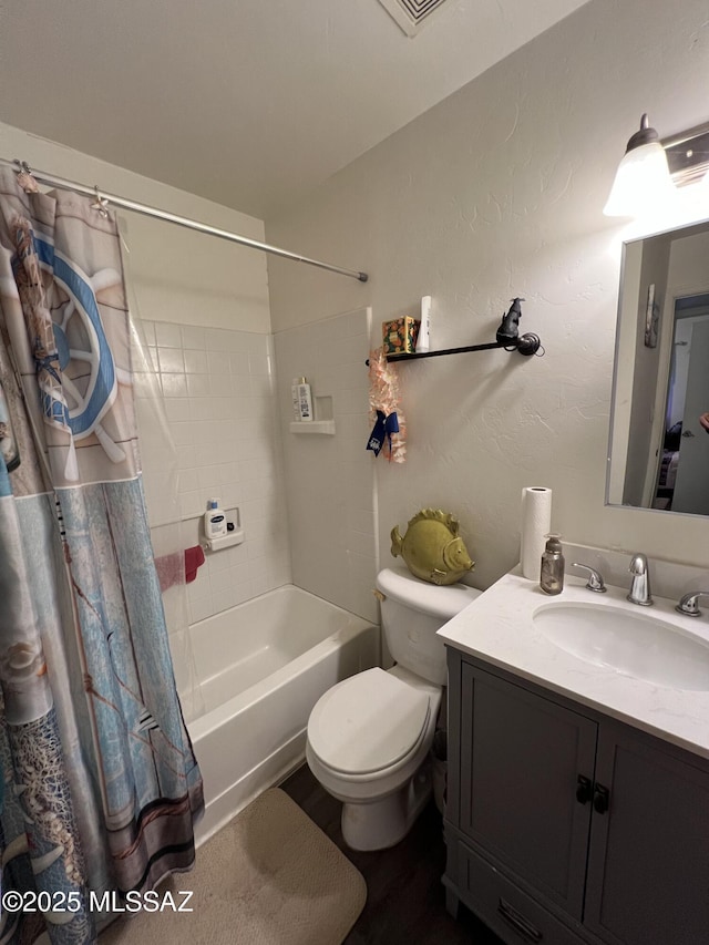 full bathroom with toilet, vanity, and shower / tub combo with curtain