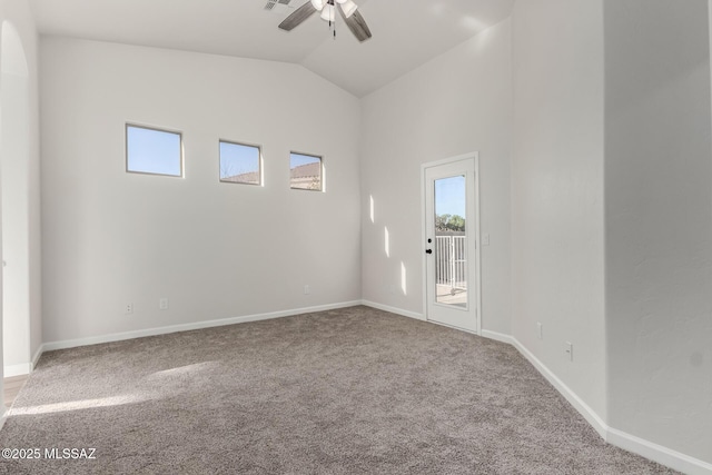 unfurnished room with vaulted ceiling, carpet, and ceiling fan