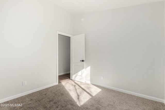 unfurnished room featuring carpet floors