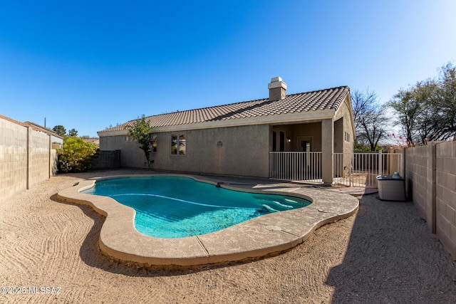 view of swimming pool with a patio