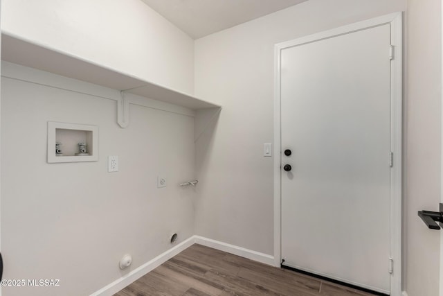 washroom featuring hookup for a washing machine, hookup for a gas dryer, and wood-type flooring