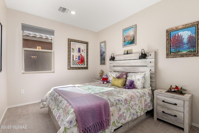 bedroom featuring light carpet