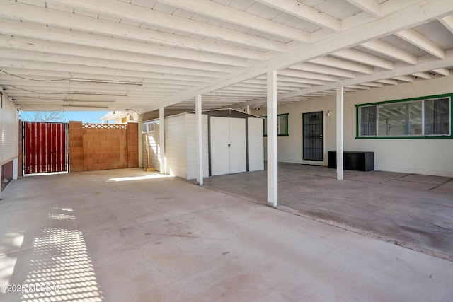 view of patio with a shed