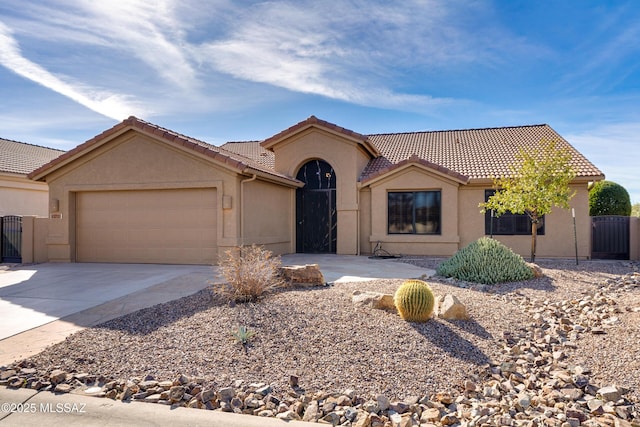 view of front of property with a garage