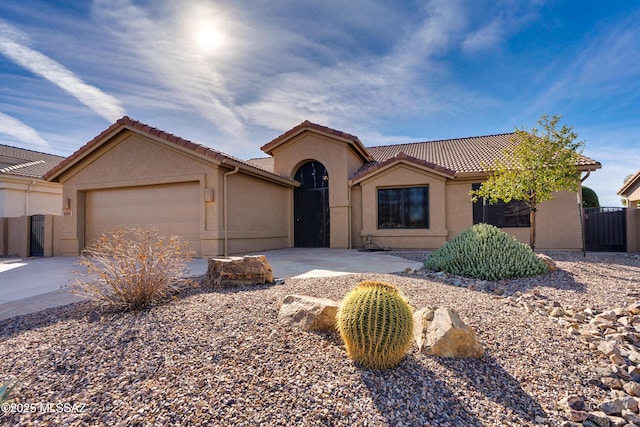 view of front of home with a garage