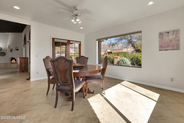 dining area with ceiling fan