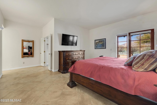 tiled bedroom with access to exterior